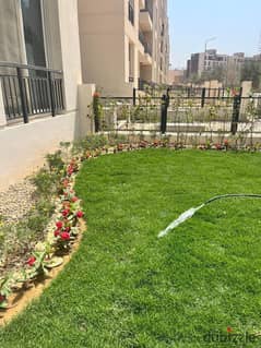 Ground floor apartment with garden for sale in Tag City Compound 0