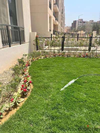 Ground floor apartment with garden for sale in Tag City Compound