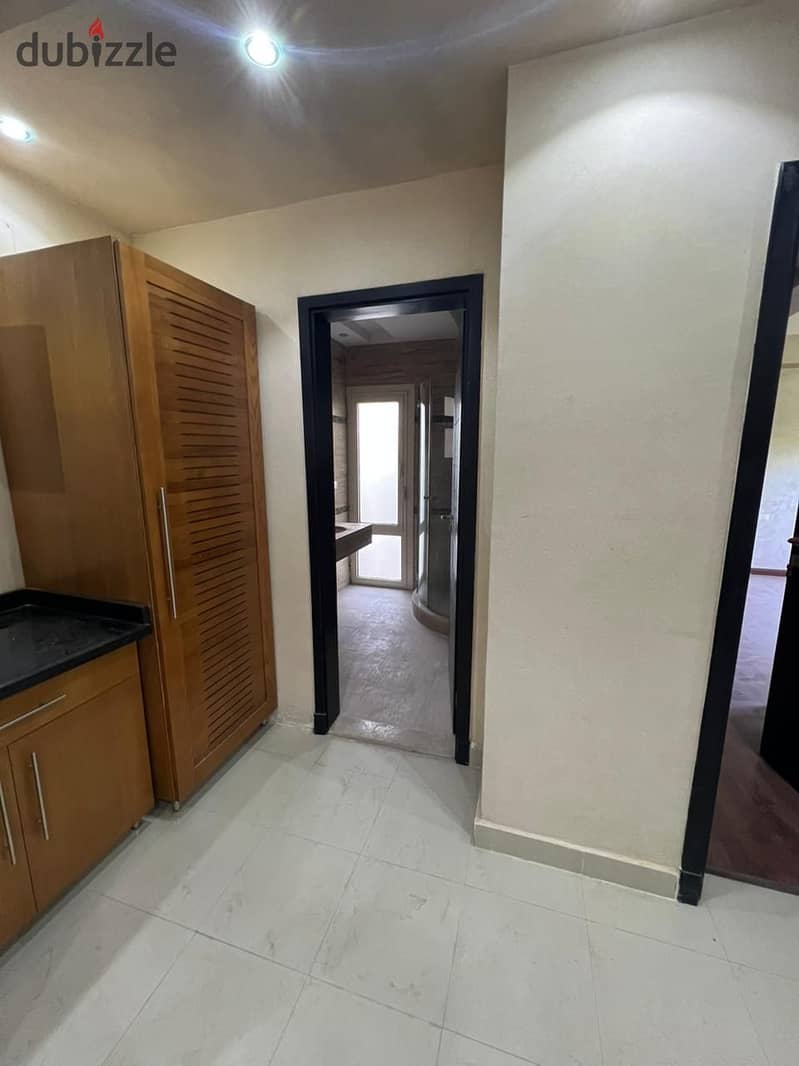 Apartment for rent, ground floor, 202 m, with a 300 m garden, The Address Compound, Sheikh Zayed, kitchen and air conditioners 10