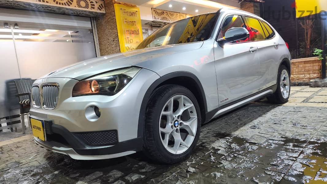 BMW X1 2013  فابريكا بالكامل عدا رفرف 0