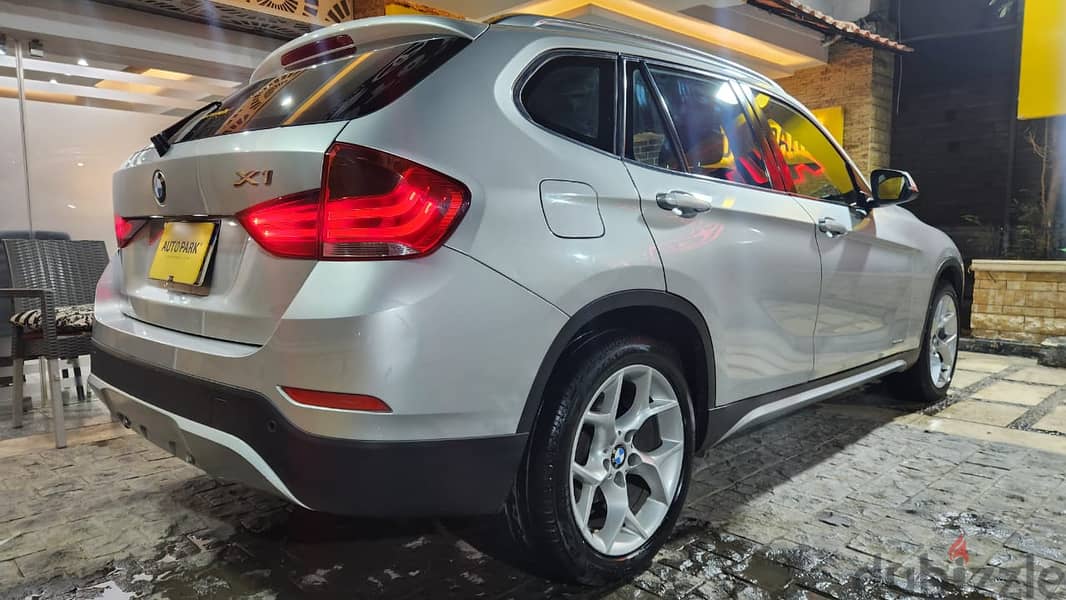 BMW X1 2013  فابريكا بالكامل عدا رفرف 5