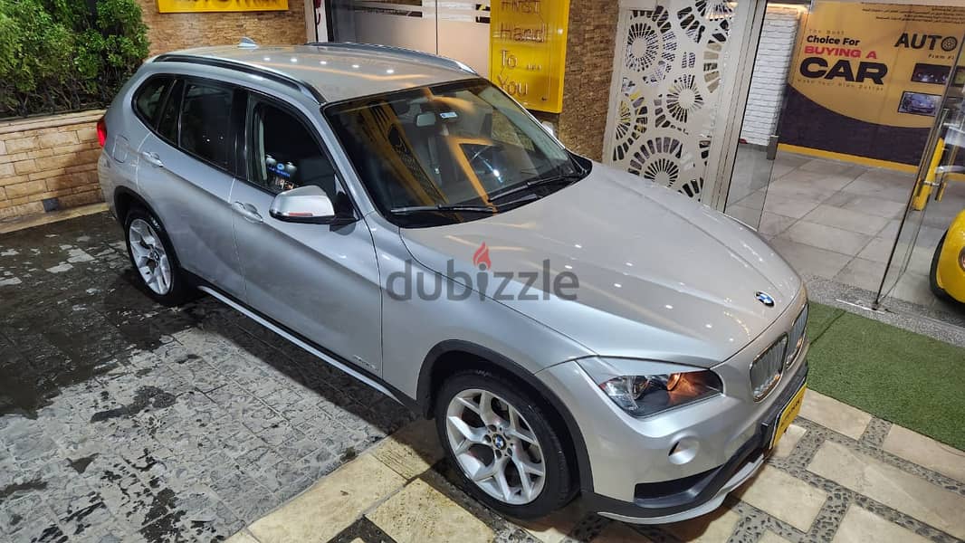 BMW X1 2013  فابريكا بالكامل عدا رفرف 6