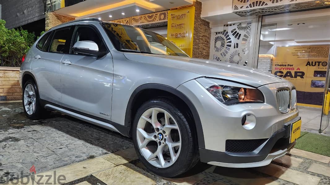 BMW X1 2013  فابريكا بالكامل عدا رفرف 7