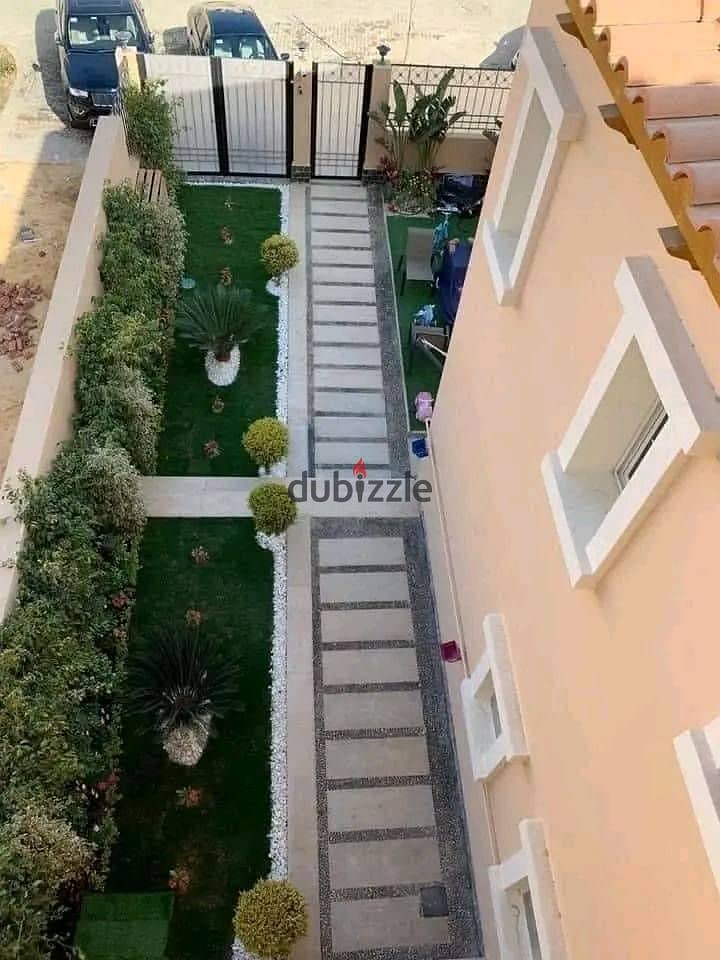 Villa with garden for sale in installments over 8 years  fenced with Madinaty  directly on the Hope Axis  in Butterfly Compound from Madinaty Misr 1