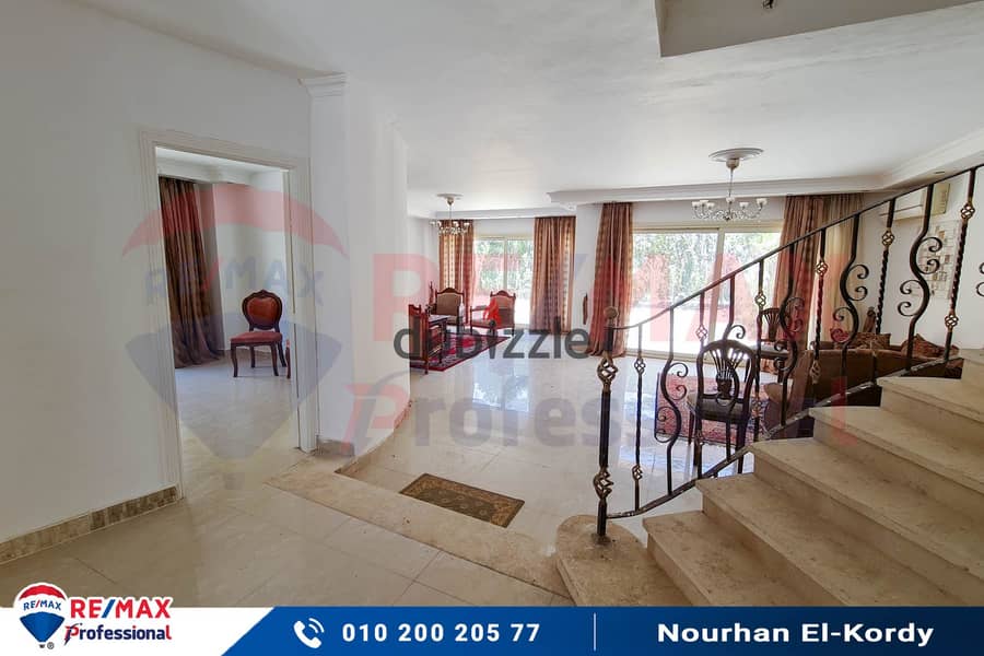 Own a twin house steps from the club in Alex West Compound 2