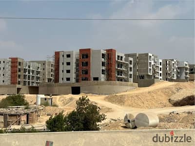 Apartment in a distinguished location, immediate delivery, for sale in Brix October Compound, with a 25% down payment and installments over 7 years