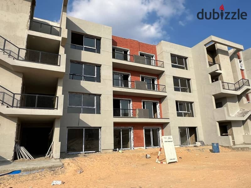 Apartment in a distinguished location, immediate delivery, for sale in Brix October Compound, with a 25% down payment and installments over 7 years 1