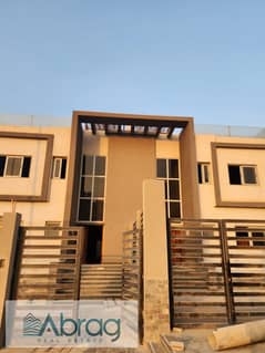 For sale in Al Khamayel, Sheikh Zayed, a twin house with a swimming pool and a distinctive view, in installments, immediate receipt