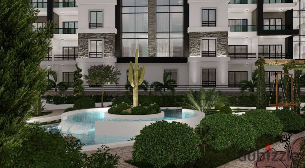 Experience luxury living in a fully-finished garden apartment with a stunning view in the heart of Old Sheikh Zayed. 3