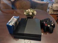 PlayStation 4 with 2 joysticks and games