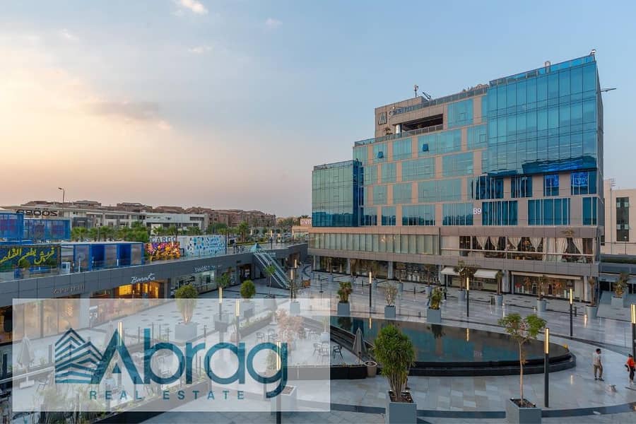 Opportunity with a dollar return, a rented administrative headquarters for sale for investment, directly on Al mehwar, Sheikh Zayed Capital Business 9