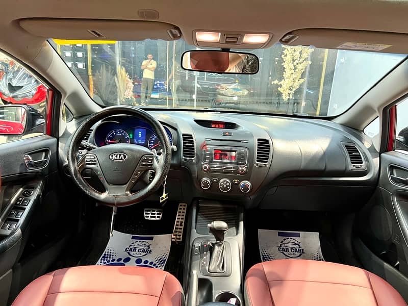 Kia Cerato 2015 فابريكة بالكامل بره وجوه 16