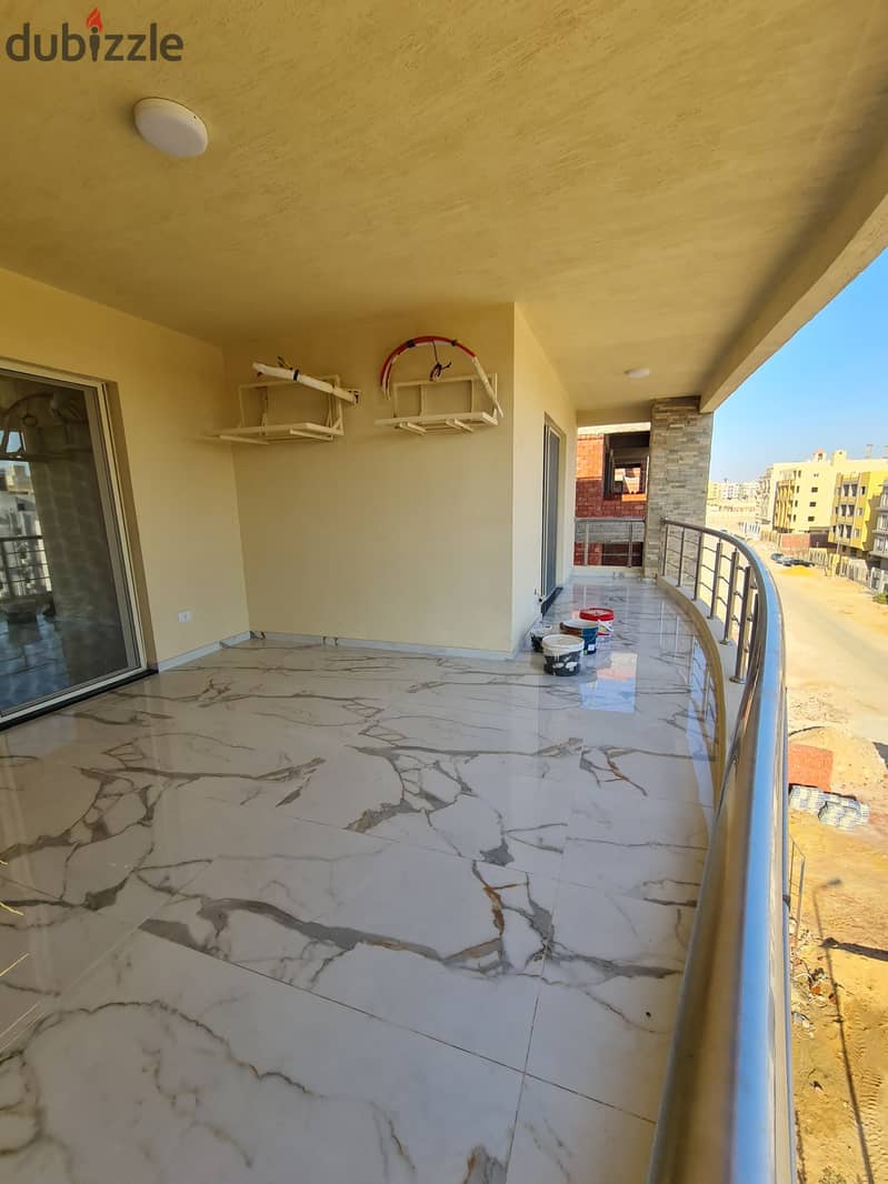 Apartment for rent first housing special finishes modern kitchen 185m and sound system steps from Katameya Dunes and useful 2