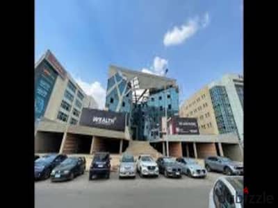 office for sale  beside AUC new cairo | installments | delivery 1 year | prime location