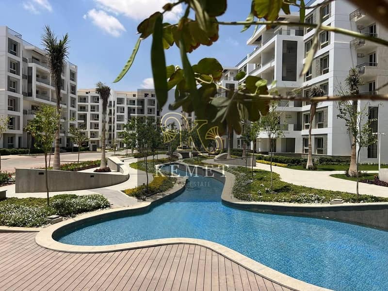 Apartment for sale, ready to move, area 180, with down payment and installments, in the Beta Greens residential compound in Mostakbal City 1