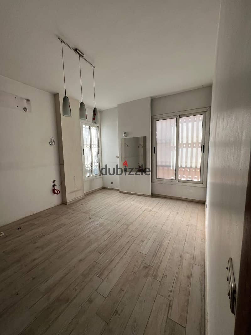 Apartment for rent with kitchen and air conditioners in the Fifth Settlement in the Second District 1