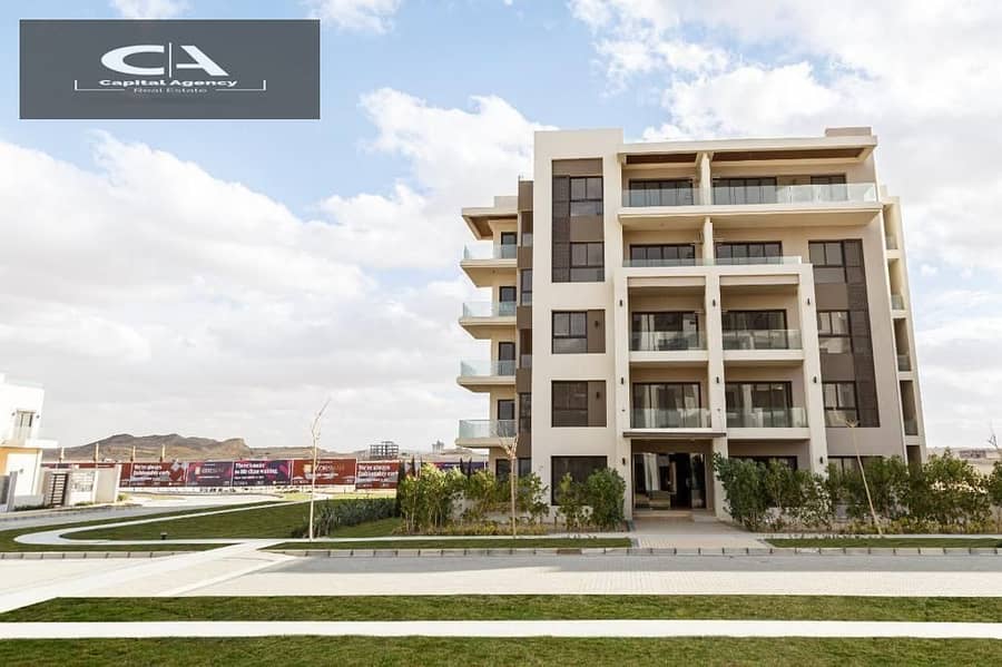 Own an apartment with a 15% down payment fully finished delivery in 18 months installments up to 7 years in the heart of Sheikh Zayed in _ Bliss Gate 0