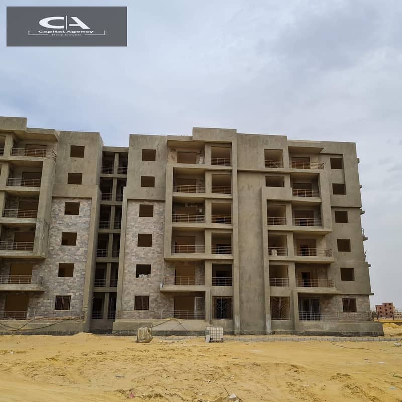 Own an apartment with a 15% down payment fully finished delivery in 18 months installments up to 7 years in the heart of Sheikh Zayed in _ Bliss Gate 3