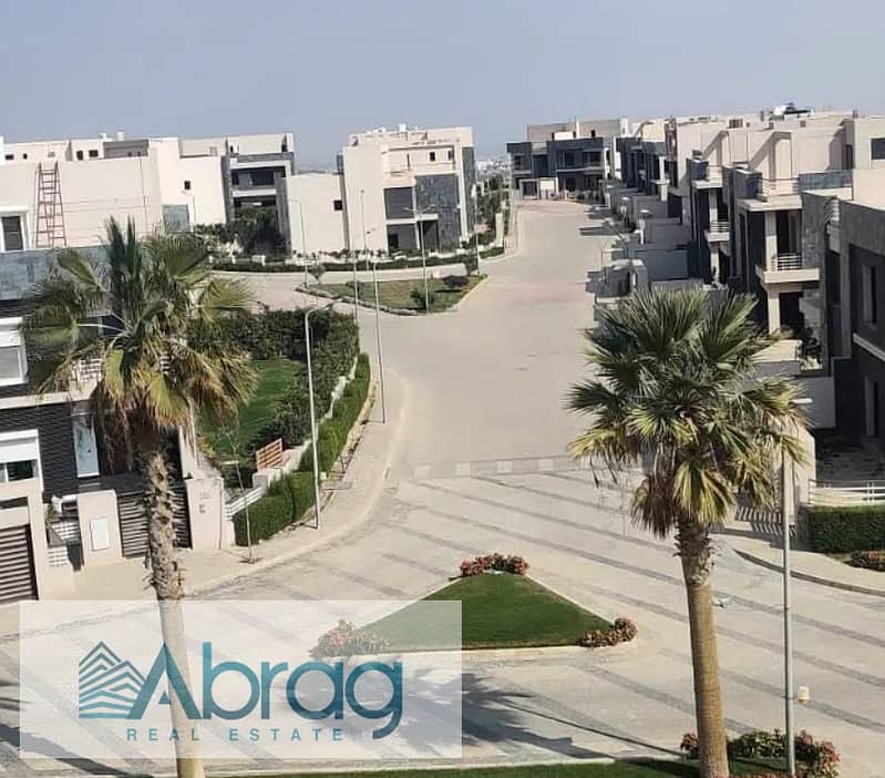 For sale, a twin house villa with a distinctive view, immediate delivery, Al Karma 4 Compound, Sheikh Zayed 2