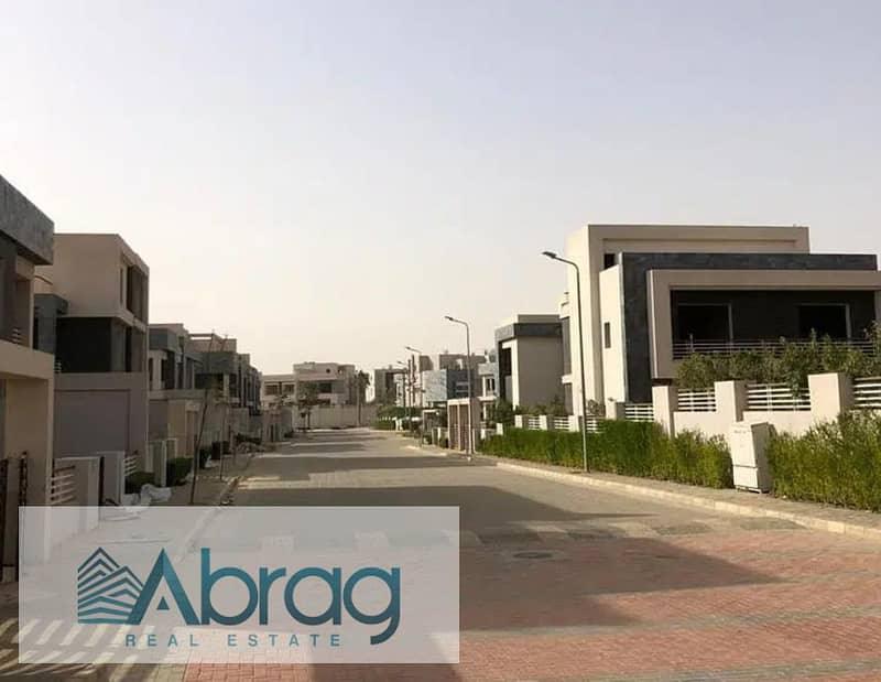 For sale, a twin house villa with a distinctive view, immediate delivery, Al Karma 4 Compound, Sheikh Zayed 3