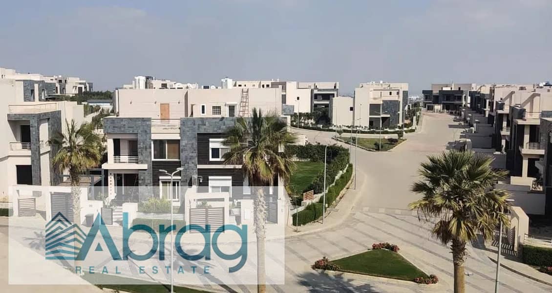 For sale, a twin house villa with a distinctive view, immediate delivery, Al Karma 4 Compound, Sheikh Zayed 4