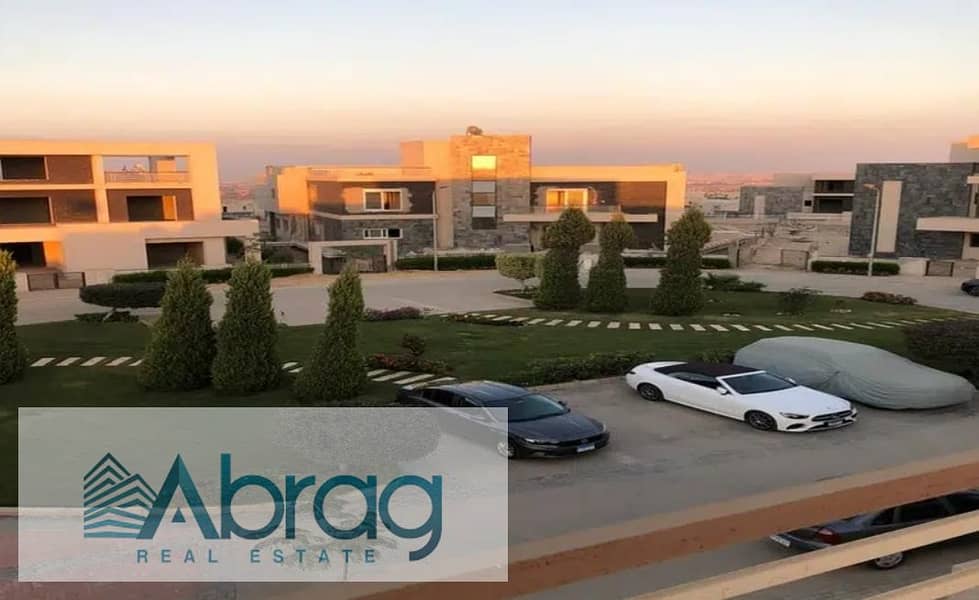 For sale, a twin house villa with a distinctive view, immediate delivery, Al Karma 4 Compound, Sheikh Zayed 7