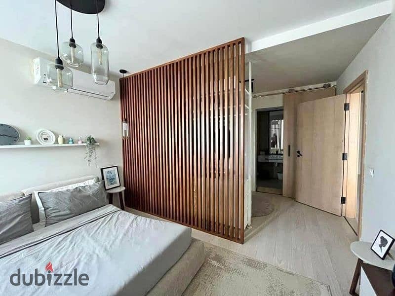 Apartment for sale in installments in a private garden, finished with air conditioners, on the Landscape in the Landscape Compound in the Revali Compo 1