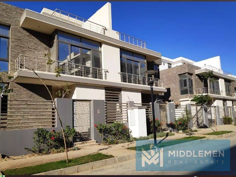 Q villa duplex 204m garden 39m delivered prime location , taj city new cairo 1