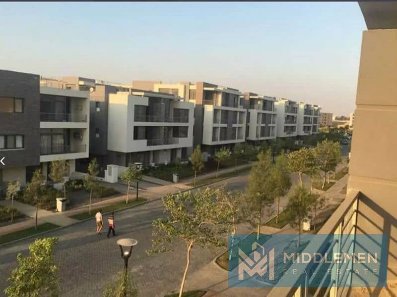 Q villa duplex 204m garden 39m delivered prime location , taj city new cairo 6