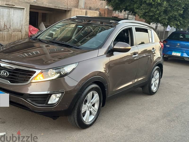 Kia Sportage 2013 فابريكا بالكامل 1