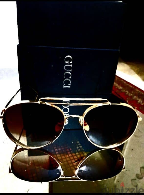 نظاره Gucci 1