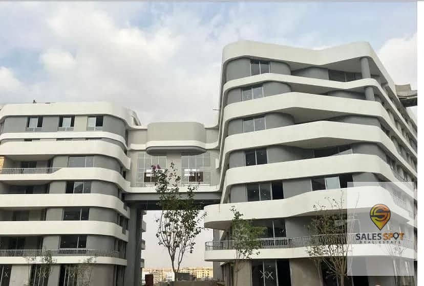 For sale in installments, a typical floor apartment 120 m two rooms including parking in Bloomfields Mostakbal City bloom fields Tatweer Misr project 11