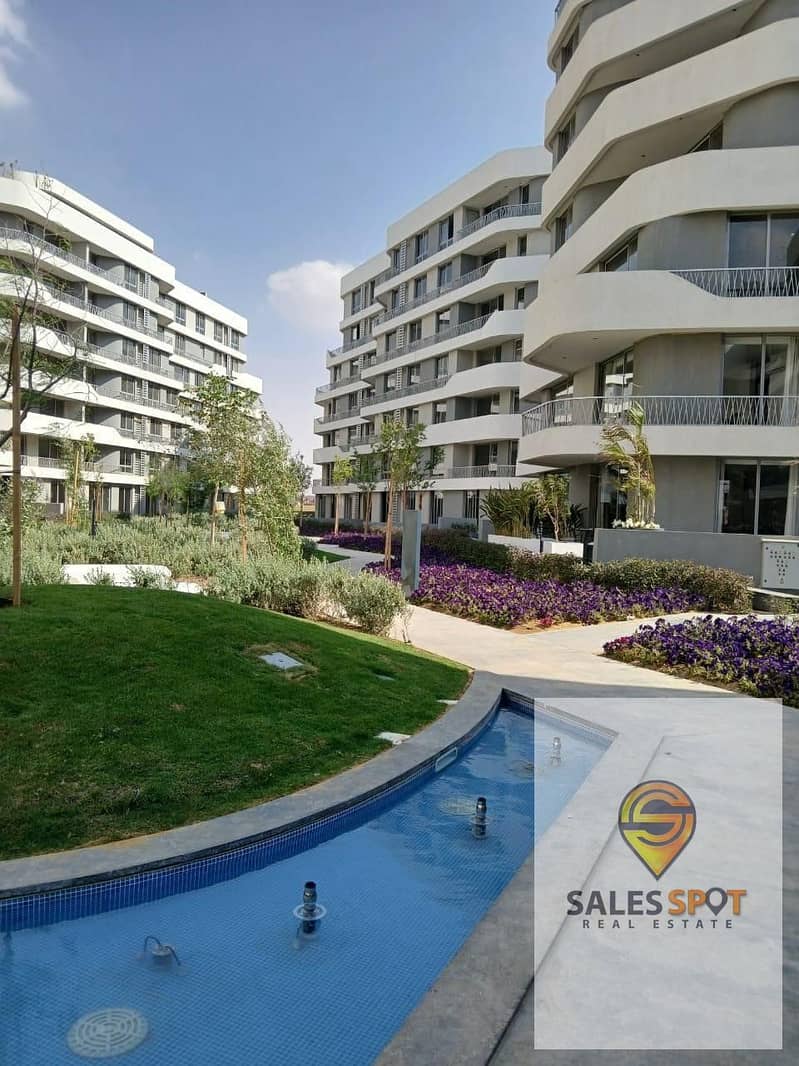 For sale in installments, a typical floor apartment 120 m two rooms including parking in Bloomfields Mostakbal City bloom fields Tatweer Misr project 12