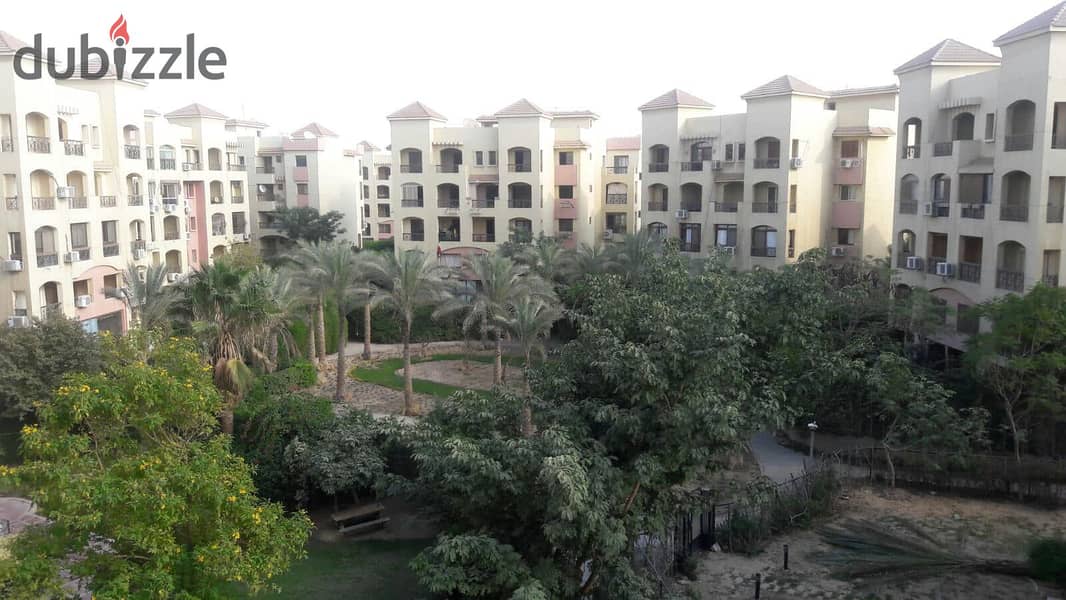 Apartment for sale with a garden in Al Ashgar Compound with a double view of green spaces and trees with the possibility of installments at the lowest 5