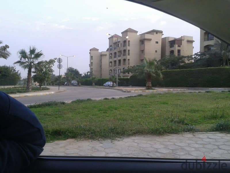 Apartment for sale with a garden in Al Ashgar Compound with a double view of green spaces and trees with the possibility of installments at the lowest 9