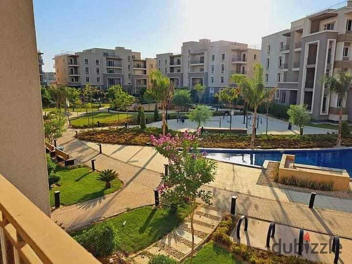 For sale, ground floor apartment in Garden Compound, October Plaza, Sodic, 6th of October City, next to Mountain View iCity 1