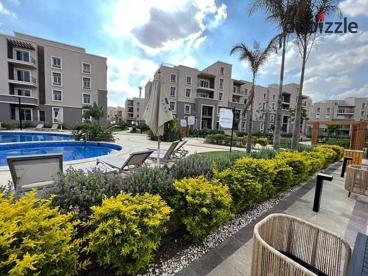 For sale, ground floor apartment in Garden Compound, October Plaza, Sodic, 6th of October City, next to Mountain View iCity 3