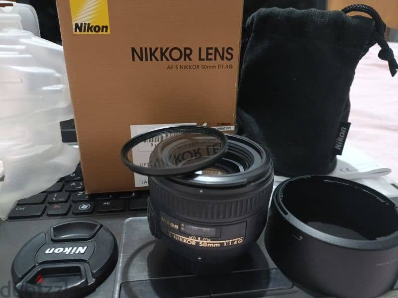 للبيع عدسة AF-S NIKKOR مقاس 50 مم فتحة f/1.4G. للمصوريين المحترفين 5