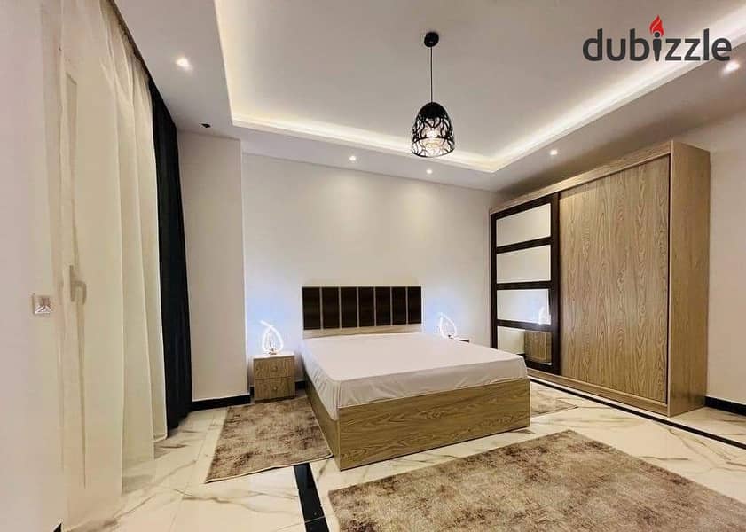 Apartment for sale in the Administrative Capital with a down payment of 820 thousand and the rest in installments over 7 years, immediate receipt wit 10