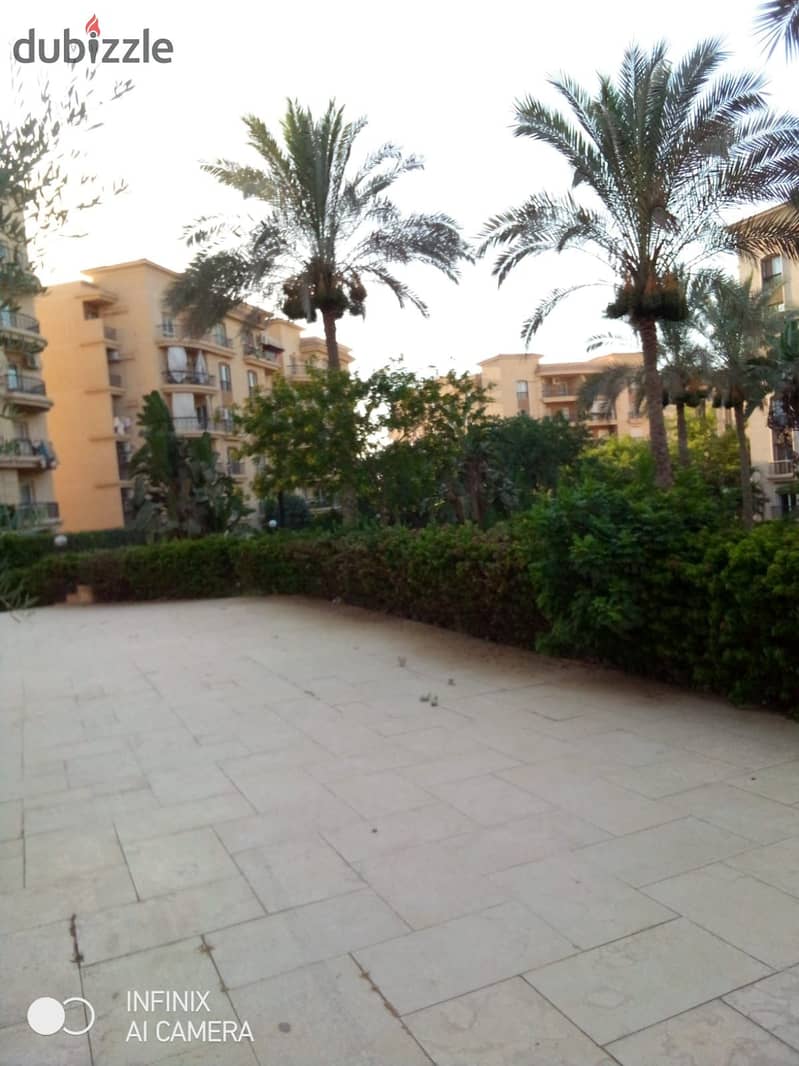 Ground floor apartment with a garden, Near of Avenue Mall , for sale Special finishes, 180 square meters, in Phase 9 7