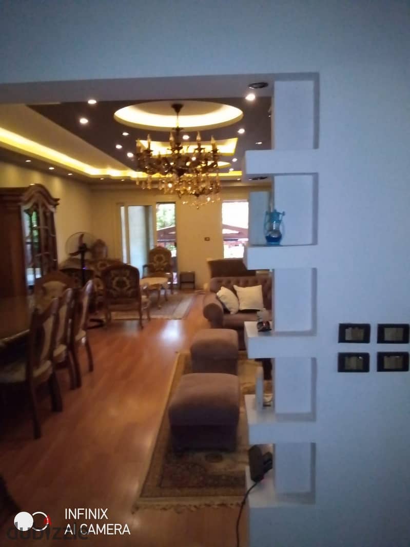 Ground floor apartment with a garden, Near of Avenue Mall , for sale Special finishes, 180 square meters, in Phase 9 13