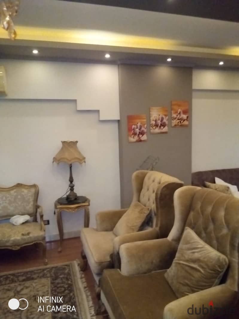 Ground floor apartment with a garden, Near of Avenue Mall , for sale Special finishes, 180 square meters, in Phase 9 14