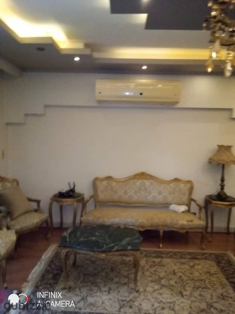 Ground floor apartment with a garden, Near of Avenue Mall , for sale Special finishes, 180 square meters, in Phase 9 18