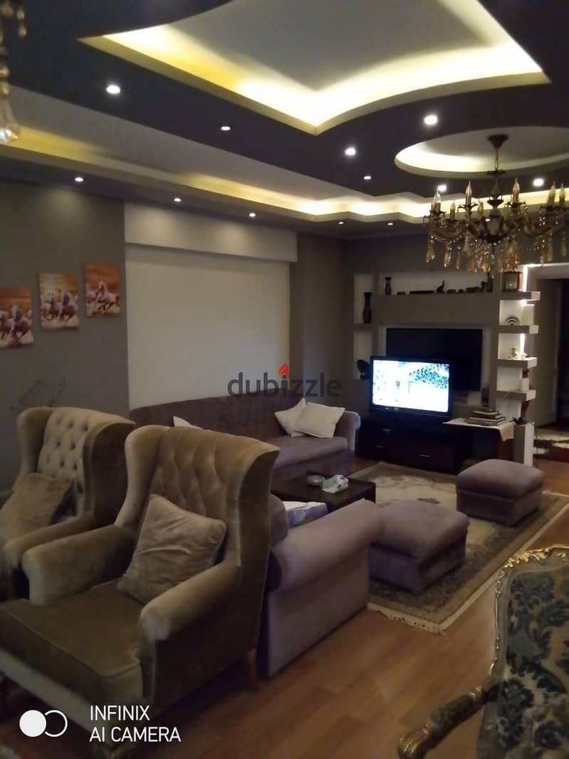 Ground floor apartment with a garden, Near of Avenue Mall , for sale Special finishes, 180 square meters, in Phase 9 20