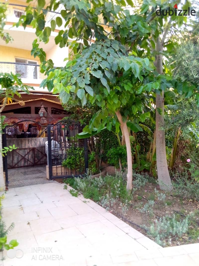 Ground floor apartment with a garden, Near of Avenue Mall , for sale Special finishes, 180 square meters, in Phase 9 21