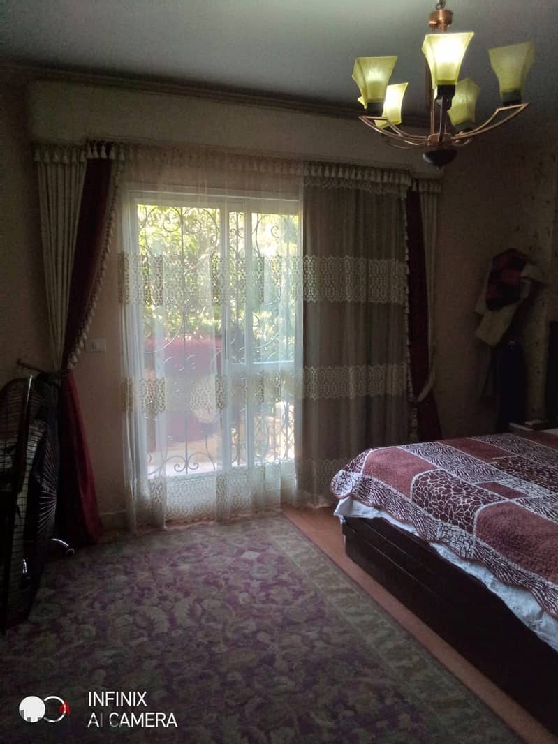 Ground floor apartment with a garden, Near of Avenue Mall , for sale Special finishes, 180 square meters, in Phase 9 28