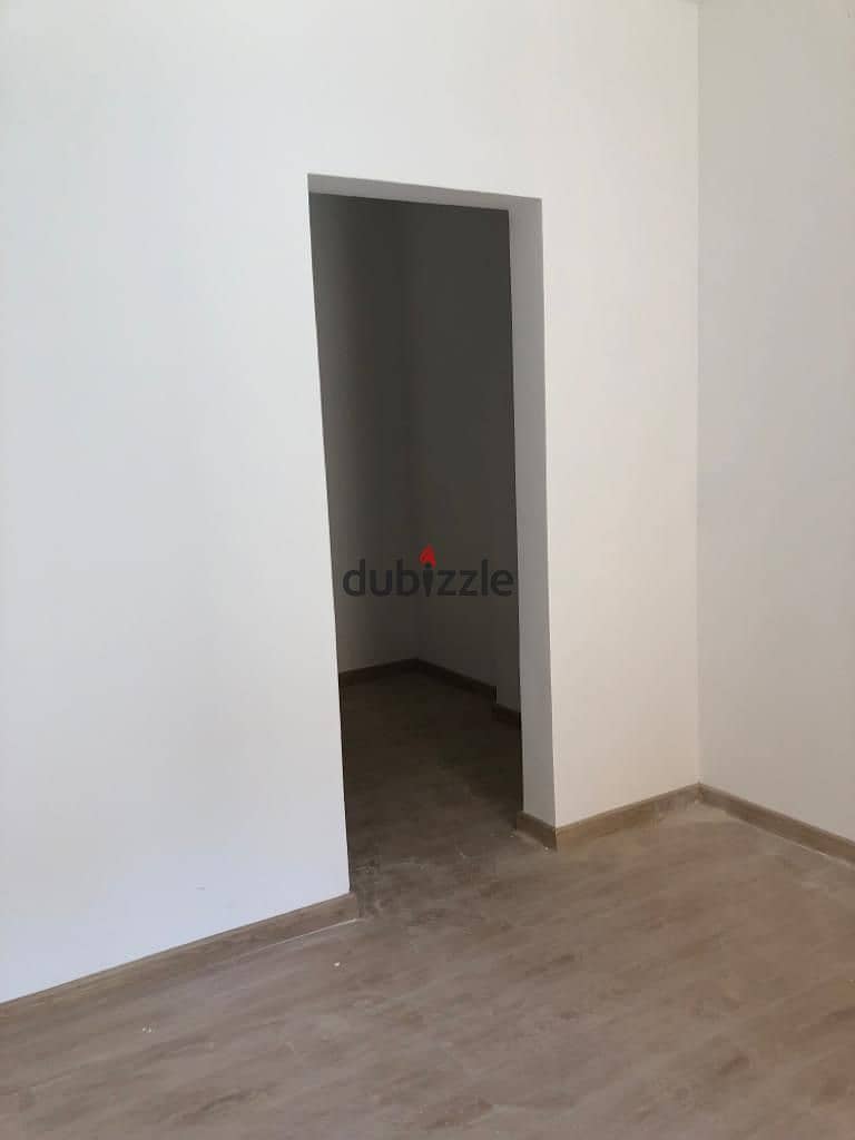 167 sqm apartment in Al Maqsad Compound, immediate receipt, prime location 6