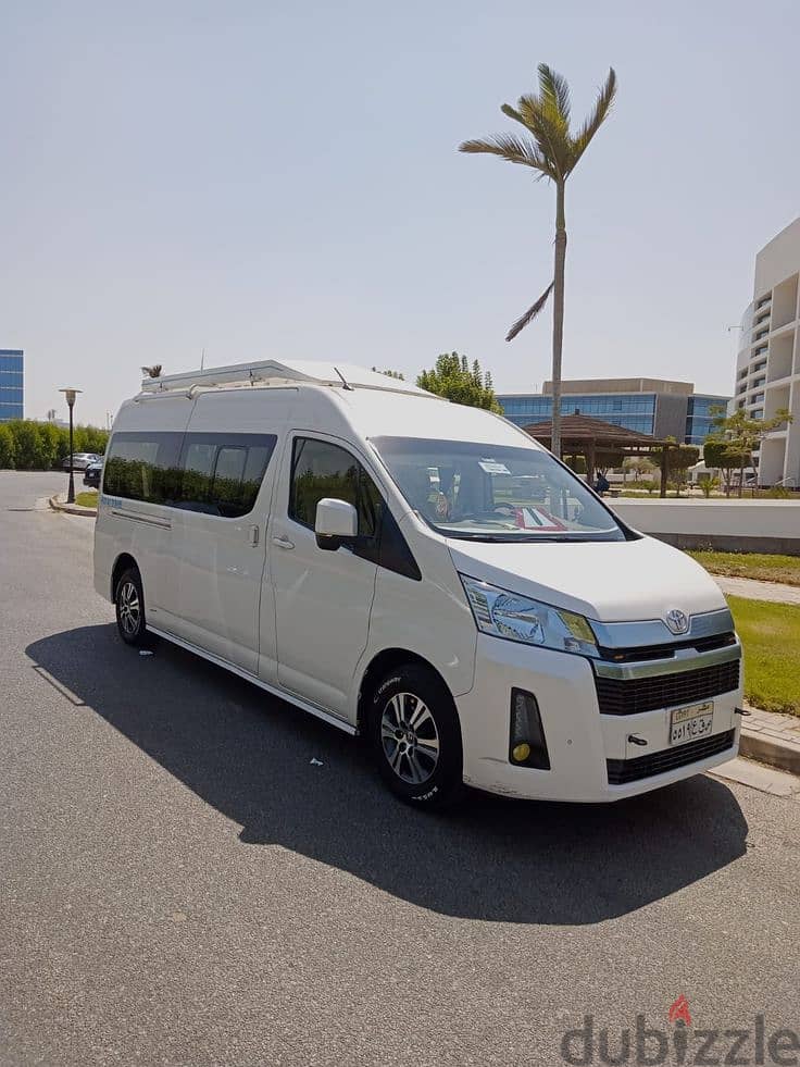 Renting an air-conditioned microbus. . . trips. . . tourist. . . to the airp 1