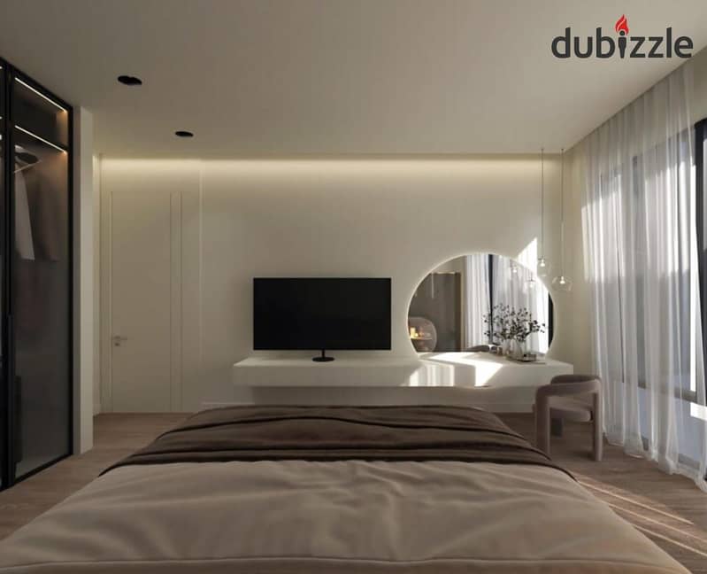 A 3-bedroom apartment with a private garden for sale in front of Dandy Mall, available in installments. 2