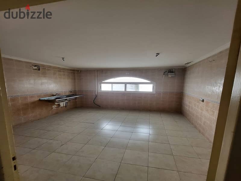 In Madinaty, an apartment for rent, 208 sqm, with an open view, will not be repeated, in front of the Food Court, the Club, and the Exhibition Market, 7